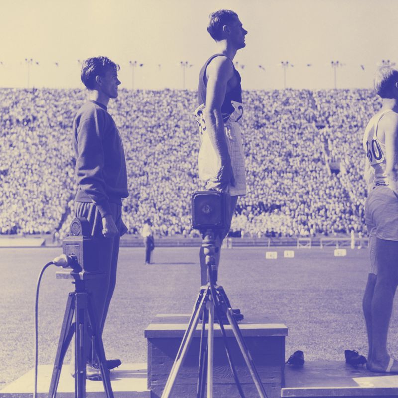 Bob Tisdall (centre) from Co. Tipperary occupies first place on the podium after winning a gold medal in the 400m hurdles at the 1932 Los Angeles Olympic Games