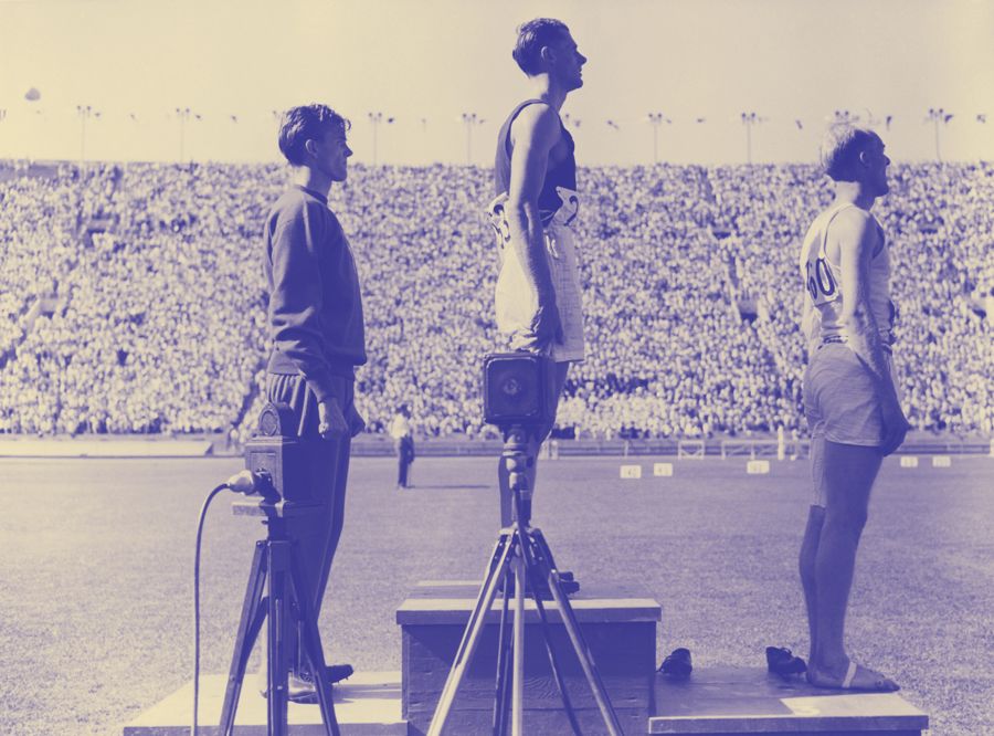 Bob Tisdall (centre) from Co. Tipperary occupies first place on the podium after winning a gold medal in the 400m hurdles at the 1932 Los Angeles Olympic Games
