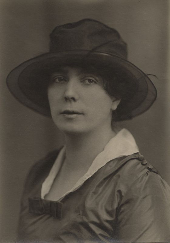 Formal portrait of Nora Joyce seated, wearing black hat, Zurich